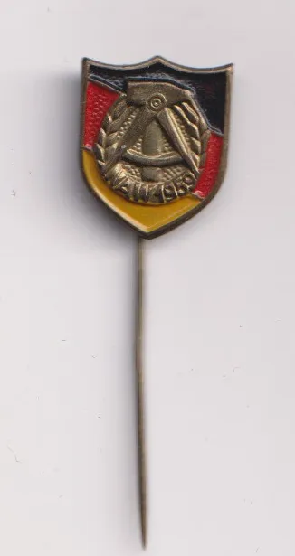 odznak se symboly země,NDR